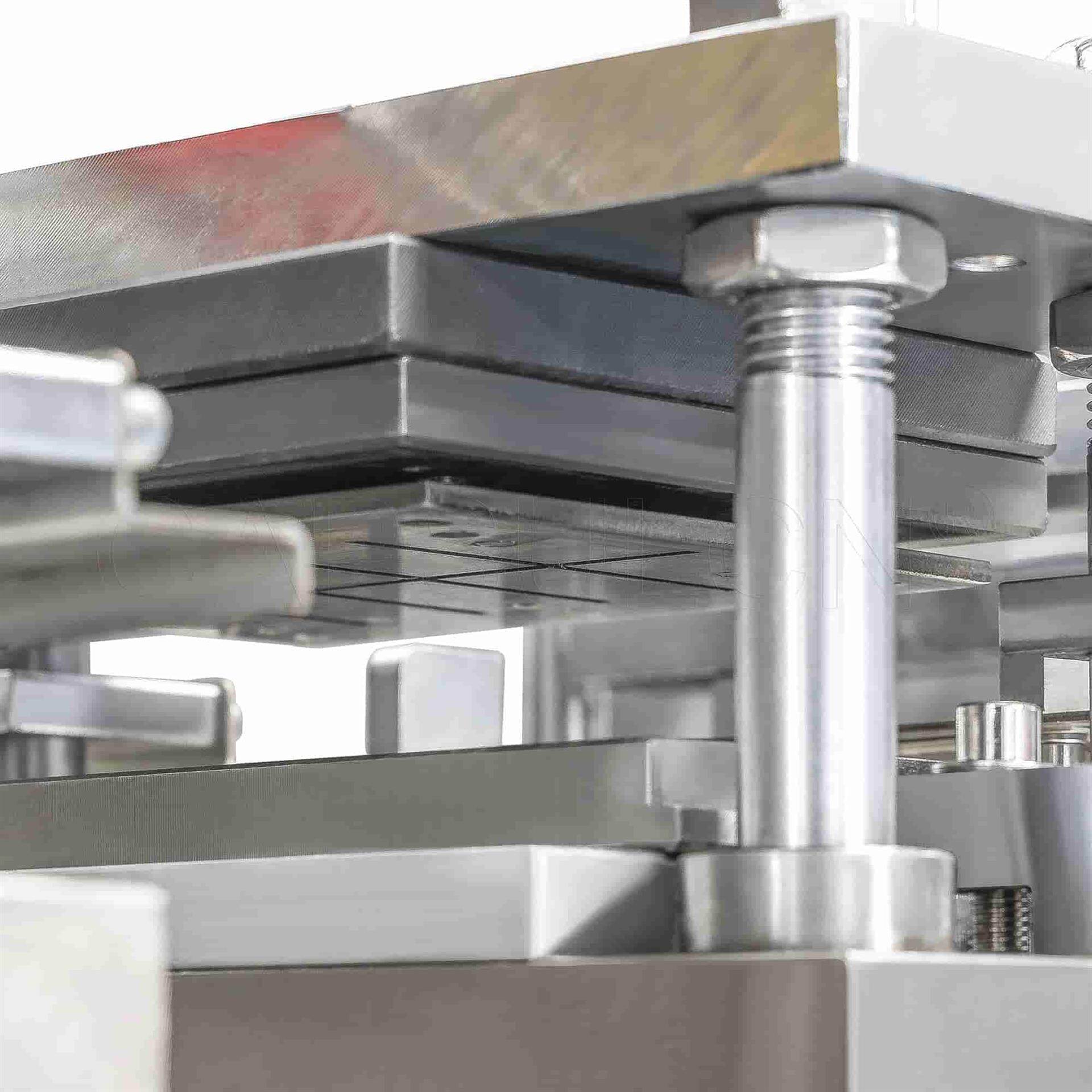 Embossing & Perforating Station